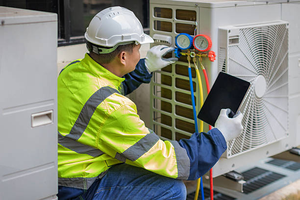 Professional Hvac technician working in East Northport, NY